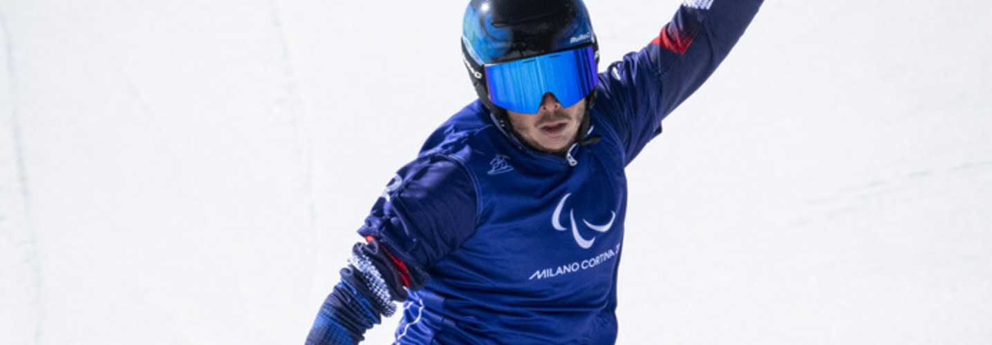 Maxime Montaggioni (FRA) competes in Snowboard Cross Mens,
